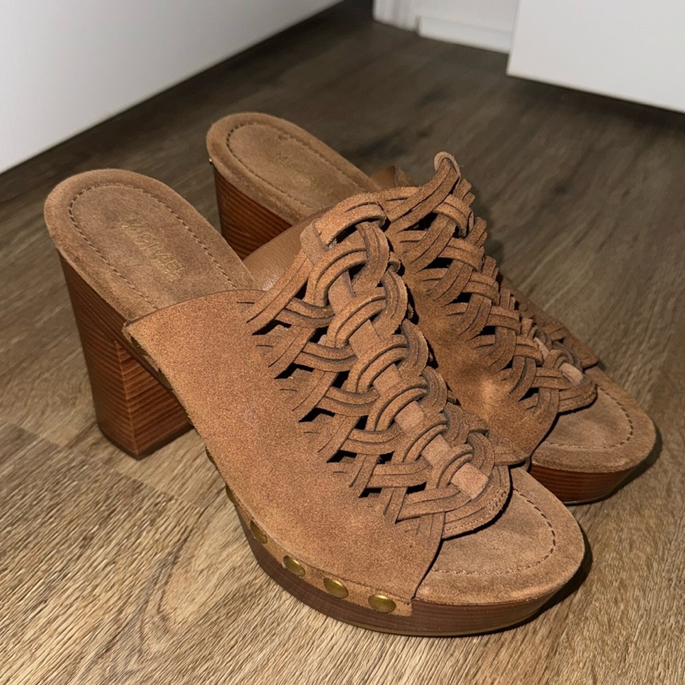 Never worn brown suede wedges. Brand new condition, no scuffing or any damage.